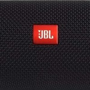 JBL Flip 5 Bluetooth speaker in black, standing upright on its rubber end cap