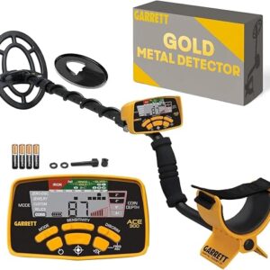 Garrett ACE 300 metal detector standing on grass with its searchcoil and LCD display