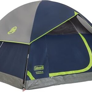 Coleman Sundome tent pitched on grass with the rainfly fitted over the dome